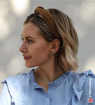 woman in blue shirt and blonde hair