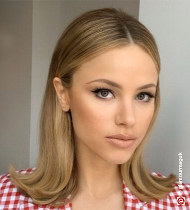 woman wearing a red and white top