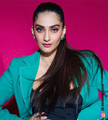 Sonam Kapoor in a green suit