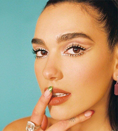 Dua lipa with a rhinestone eyelash glam