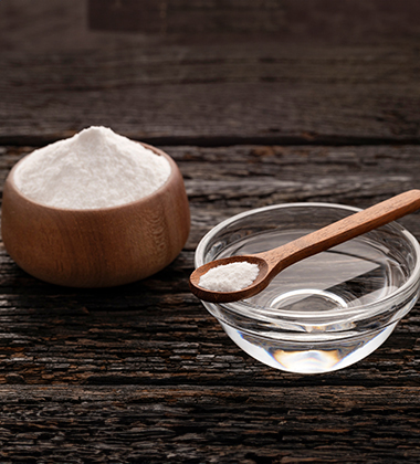 baking soda over a bowl of water
