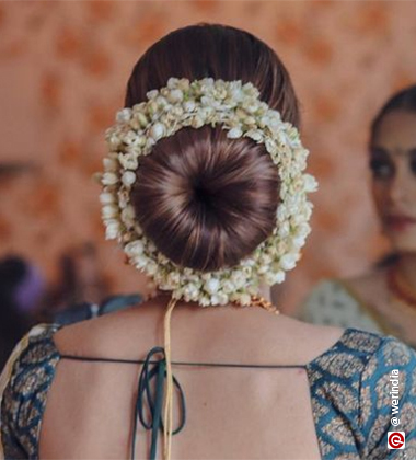 Reception Hairstyles for Saree – Minimalist Bun with Gajra