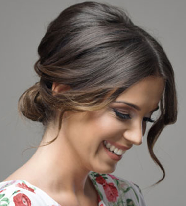 Twisted Low Bun With Puff Shoulder Length Haircut
